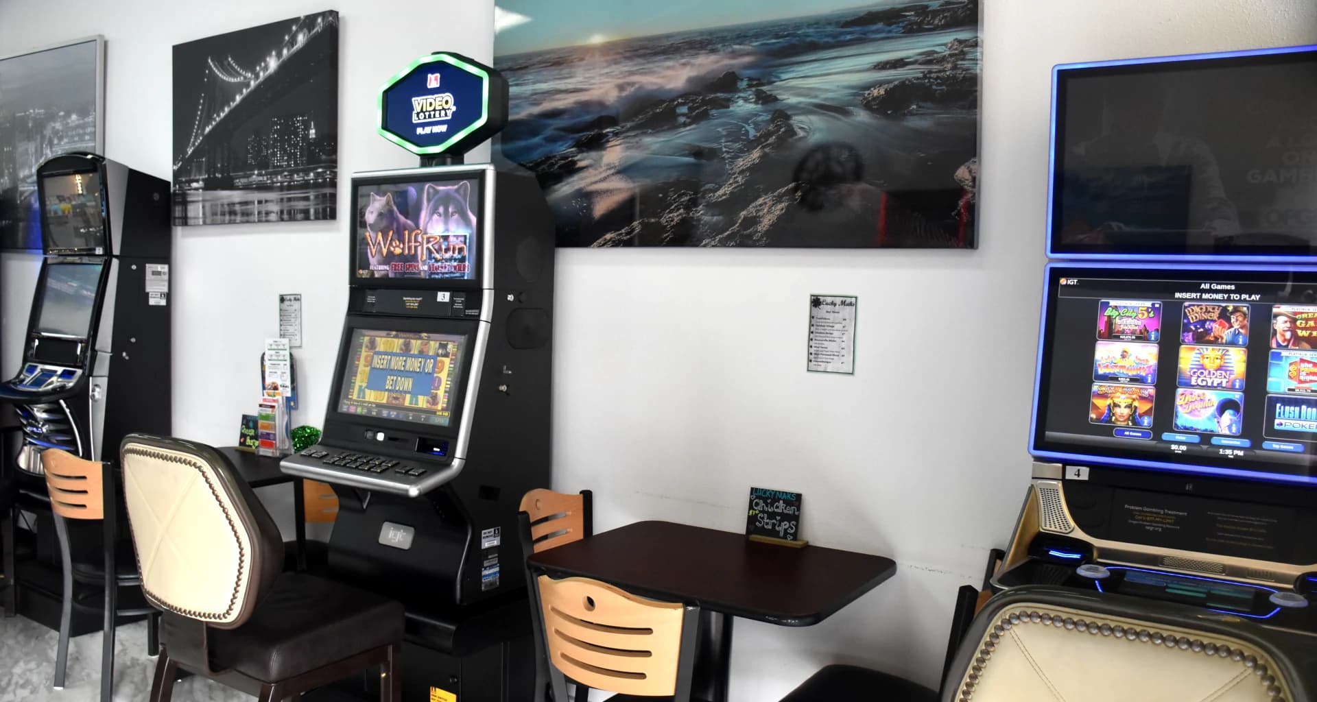 Backdrop image of video pocker slot machines and fully stocked bar